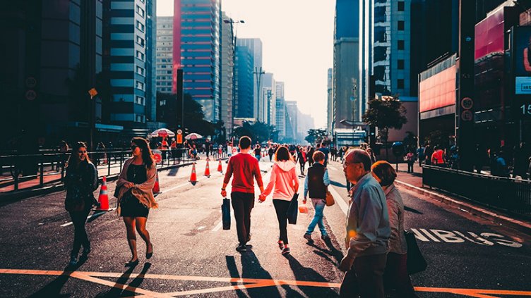 Pedestrians walking on the street in a smart city