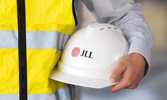JLL engineer holding the cap